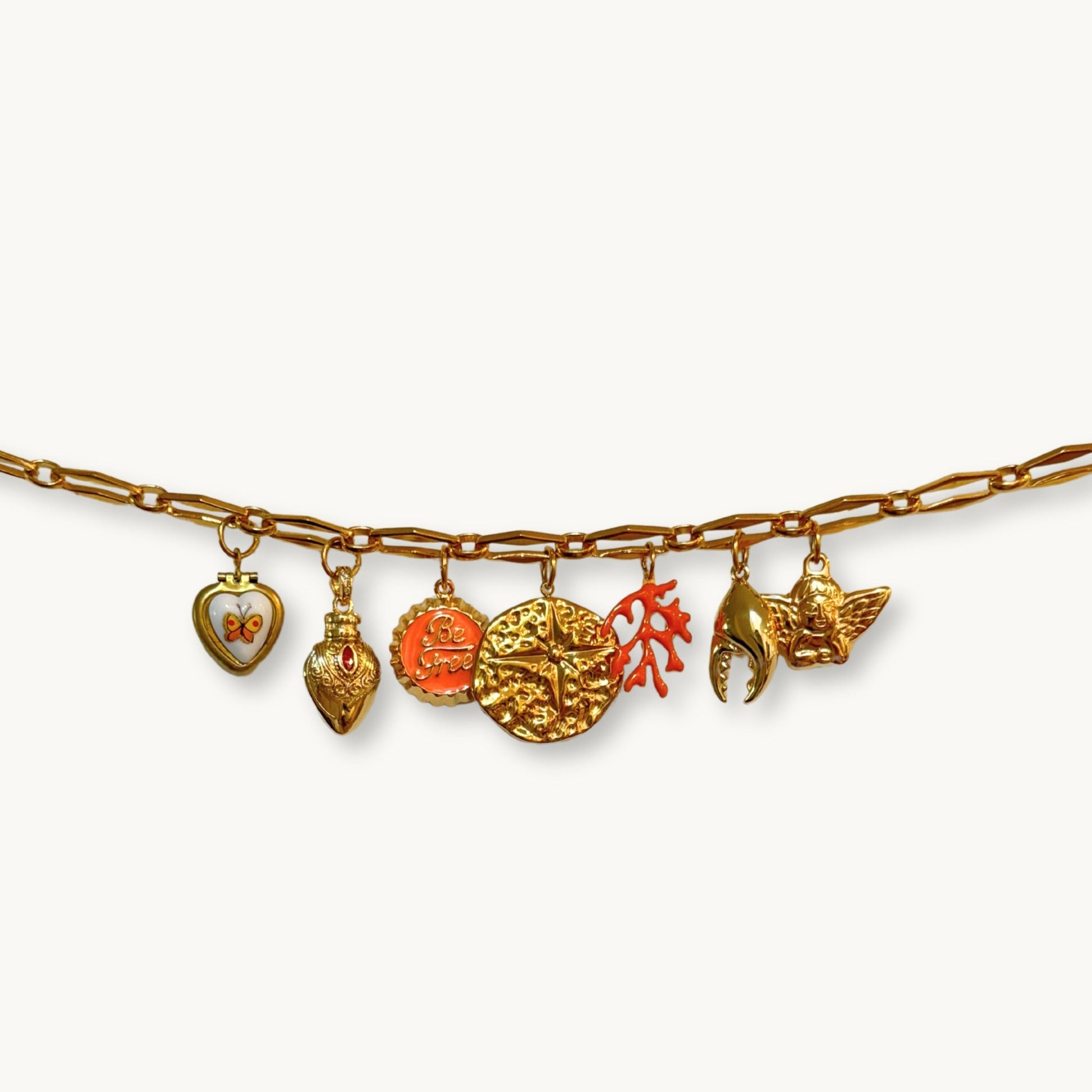 Close-up of the Lyn Necklace featuring a mix of vintage and modern charms.