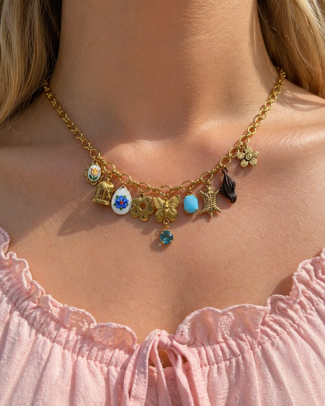Gold and silver charm necklaces with dainty and bold pendants.