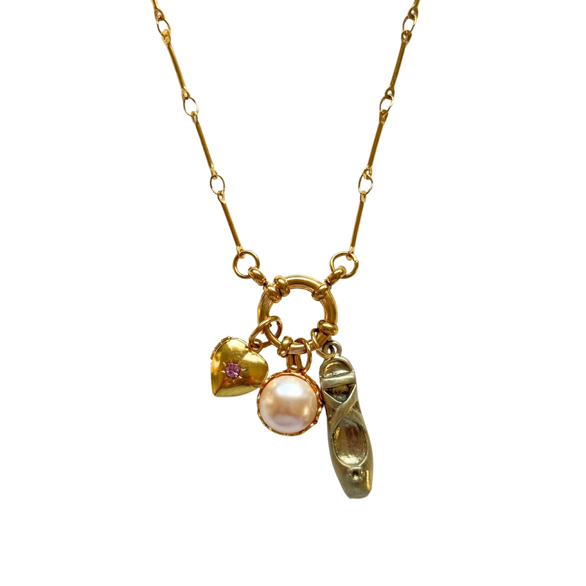 Close-up of sailor clasp and charm details on Alegra Necklace