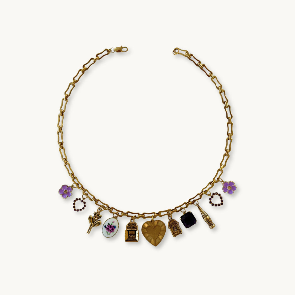 Flat-lay of the Audrey Necklace against a neutral background for a classic look.