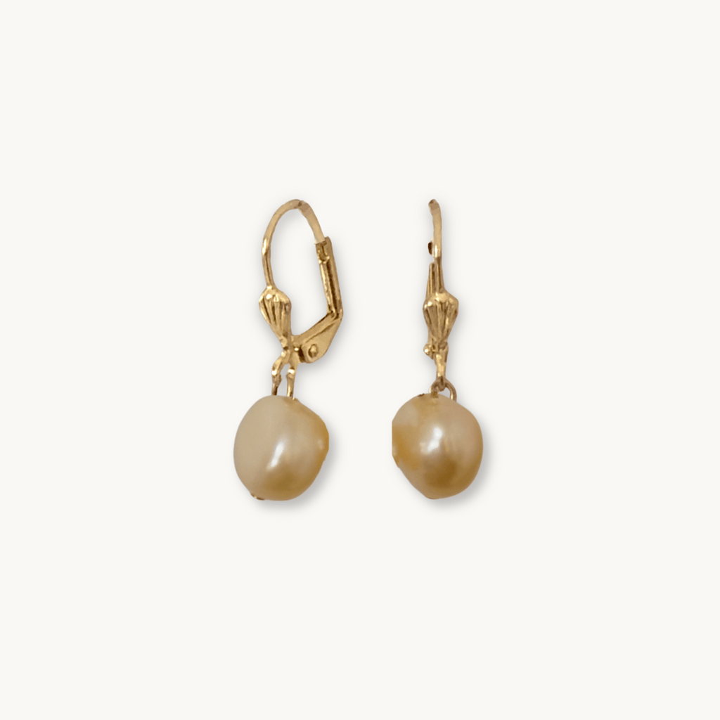 Close-up of The Aurelie Earrings in peach