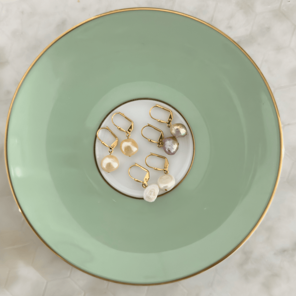 Flat lay of all color options of The Aurelie Earrings