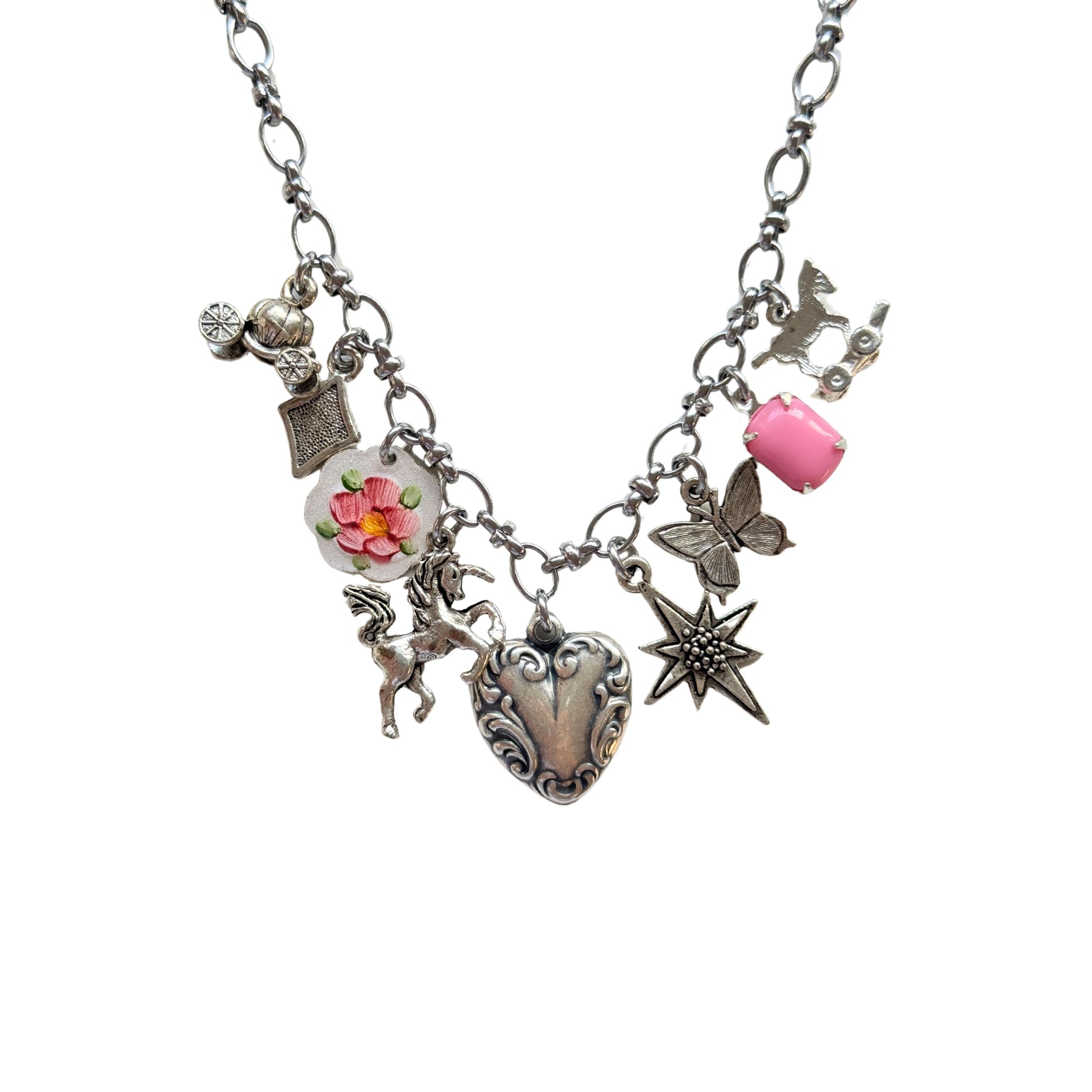 Close-up of hand-painted guilloche and pink glass stone