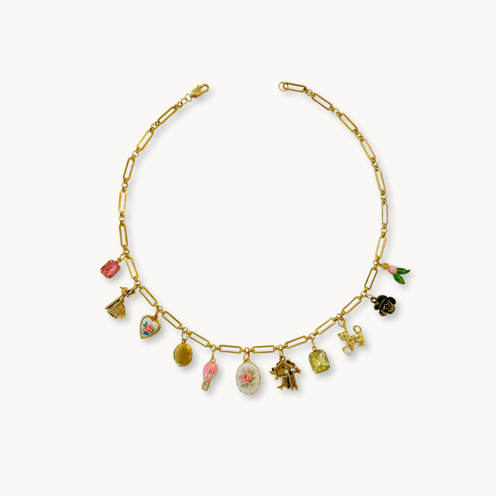 Cameron Necklace featuring an Agatha medium chain with a vintage pink rose ceramic cabochon and 10 handpicked charms.