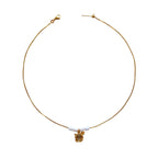 Clara Necklace flatlay with rose charm and pearls
