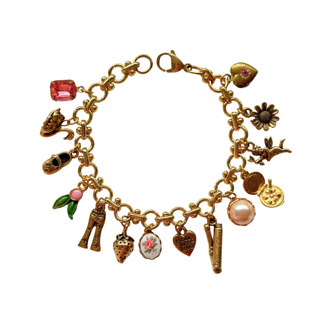 Gwen Bracelet featuring Yennifer chain, vintage stones, and delicate floral accents