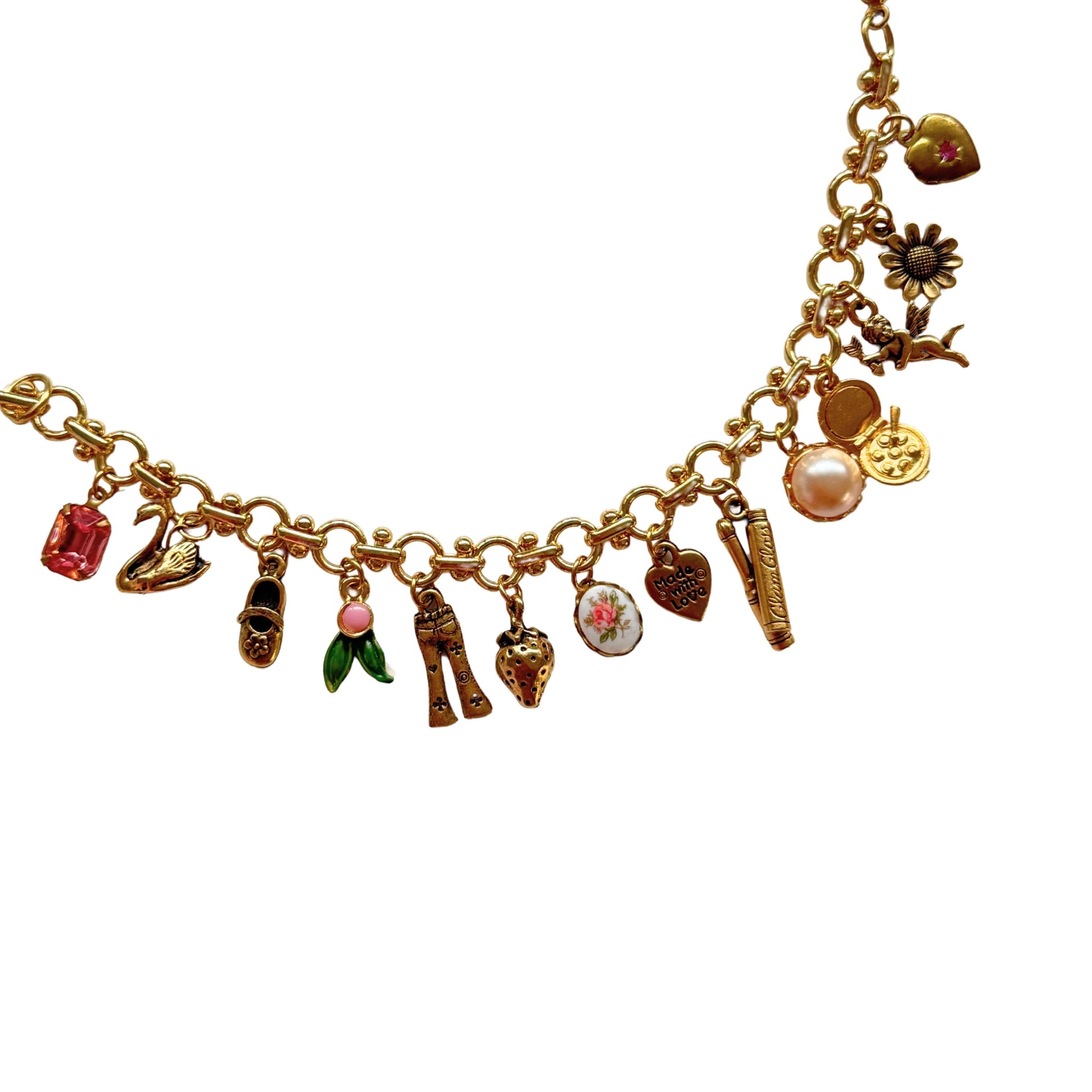 Romantic charm bracelet with pink rose ceramic, vintage locket, and gold-plated details