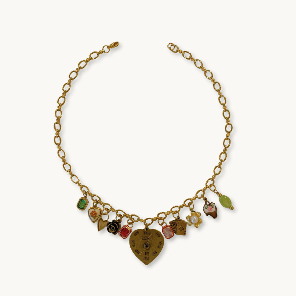 Flat-lay of the Harriet Necklace against a neutral background for a classic look.