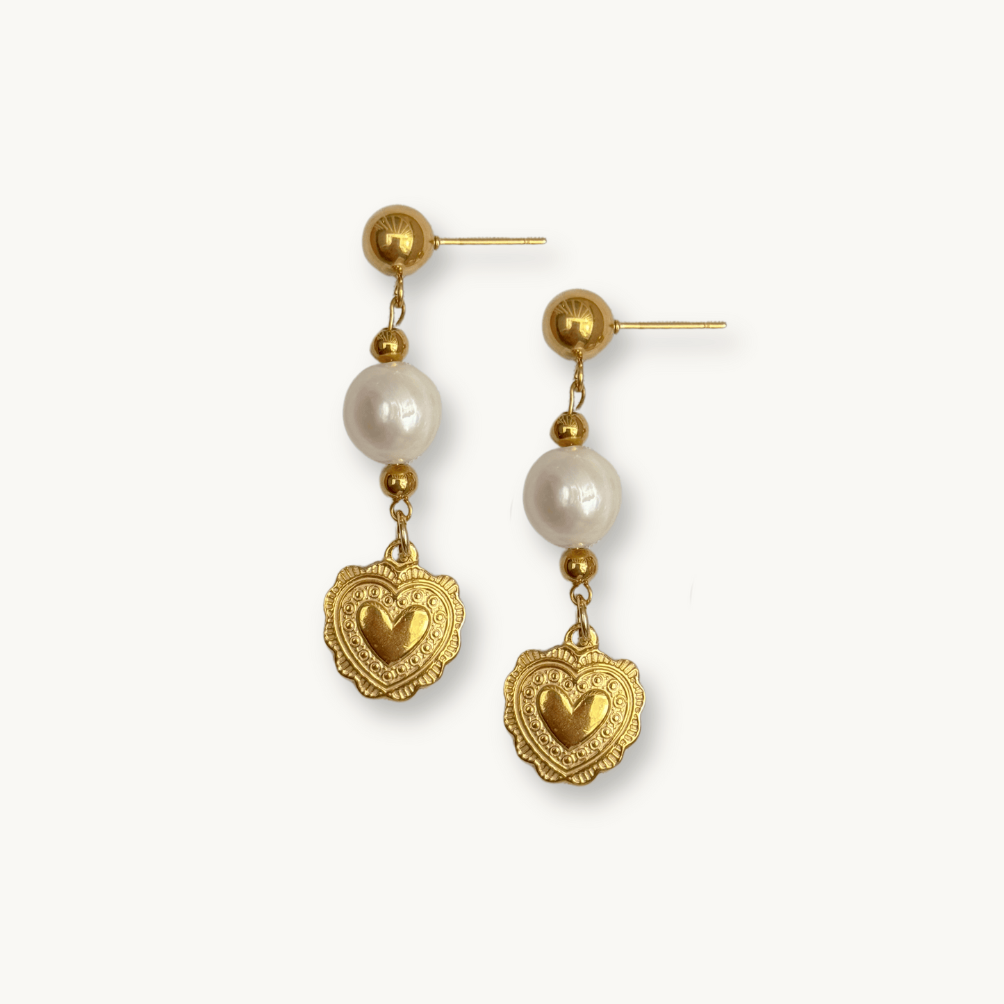 The Helena Earrings with baroque pearl and heart charm