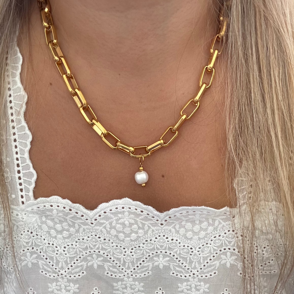 Model wearing the Beanca Necklace, showcasing its sophisticated style.