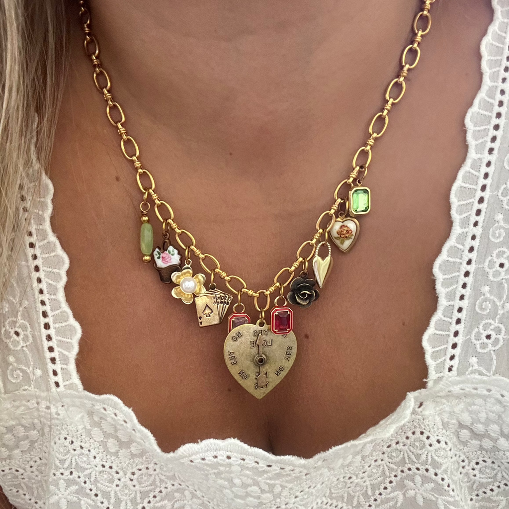 Model wearing the Harriet Necklace, showcasing its playful and elegant design