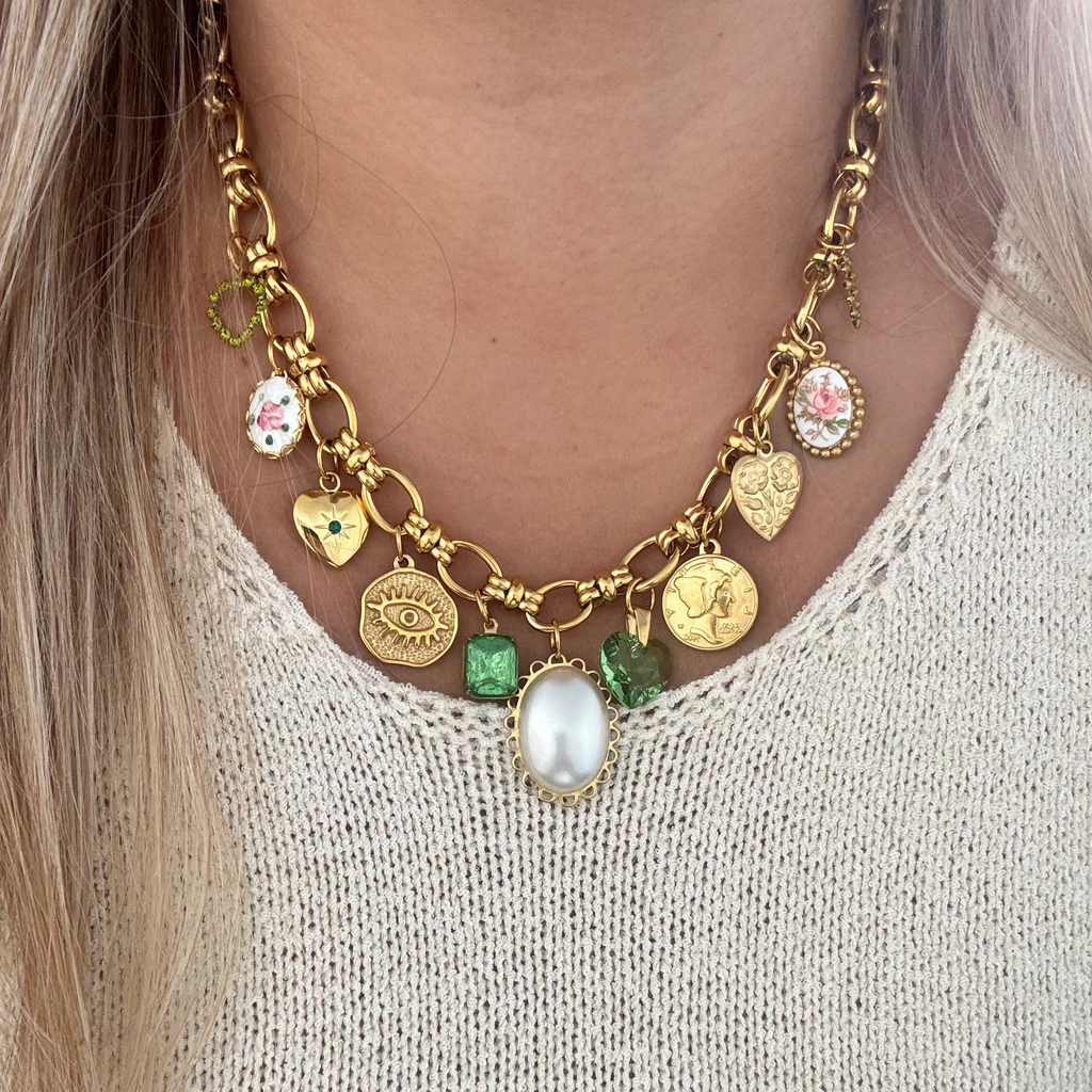 Model wearing the Zoe Necklace, displaying its chunky chain and sophisticated design.