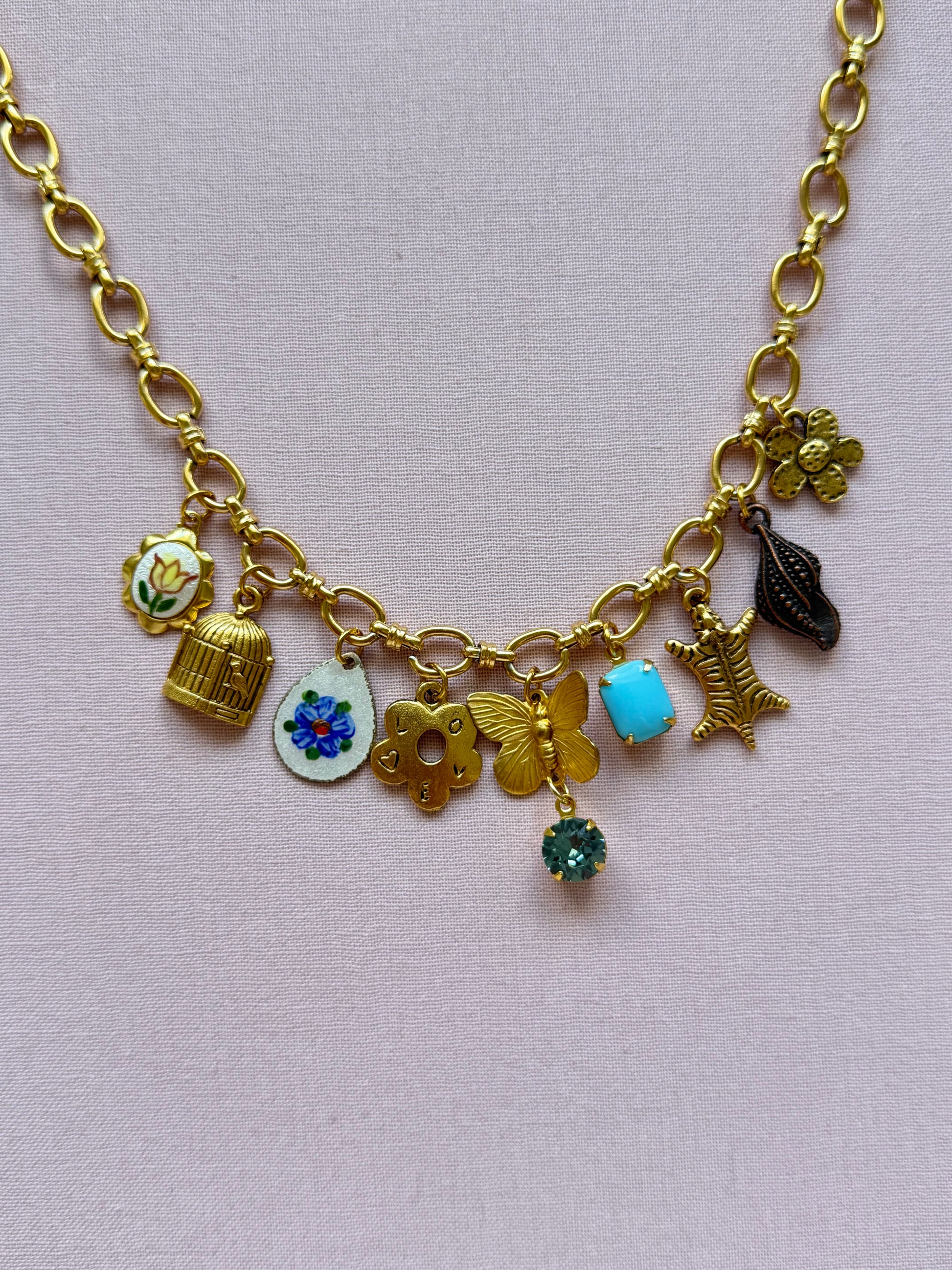 Handmade Paloma Necklace with nature-inspired vintage charms from Pretty Little Trinkets