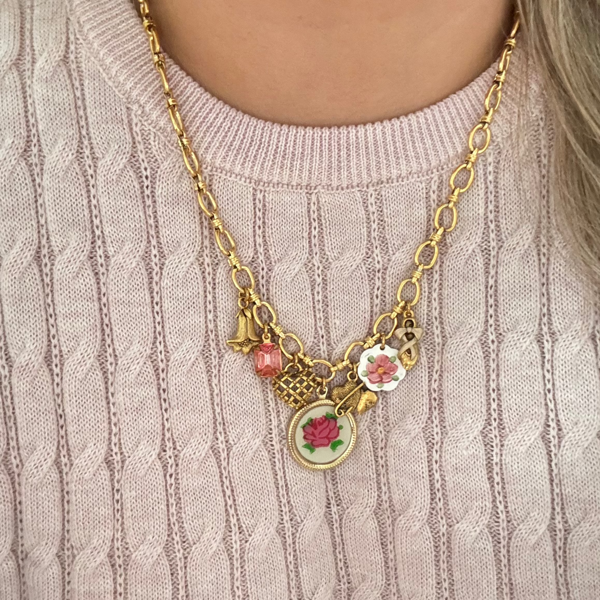 Model wearing the Darcy Necklace in a soft, elegant outfit