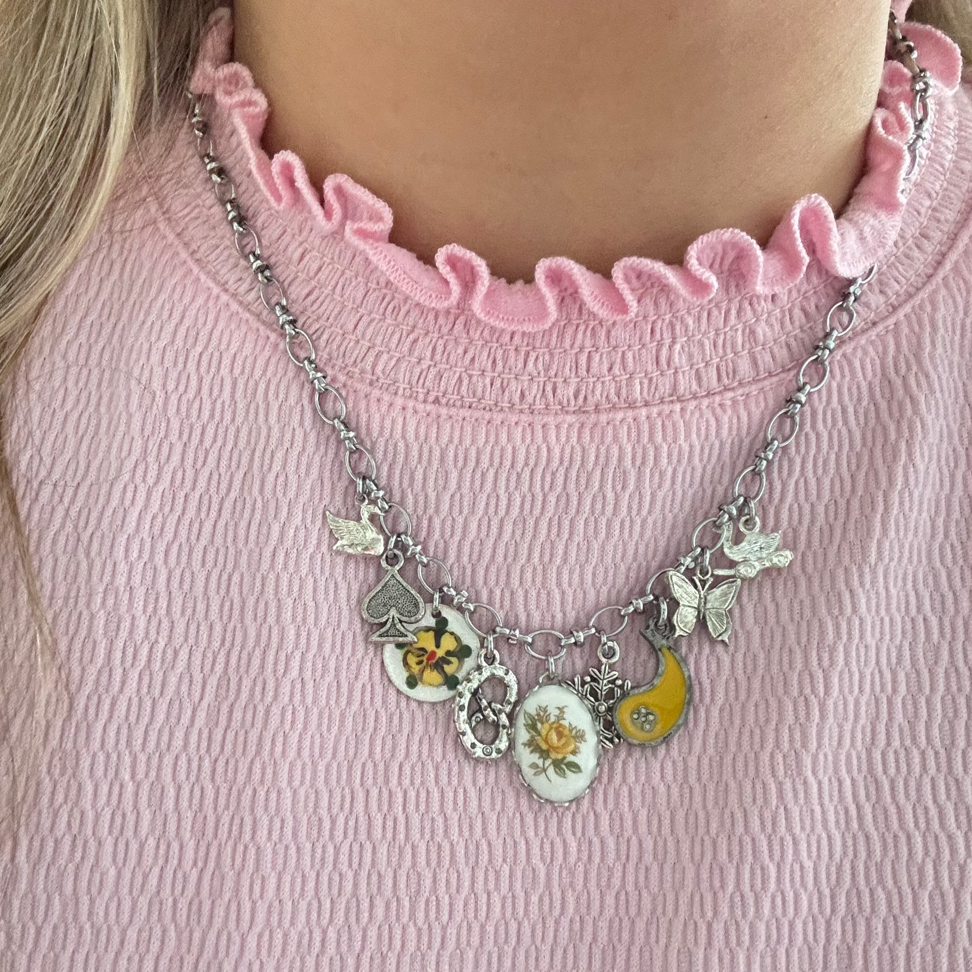 Model wearing Greta Necklace styled with pink blouse