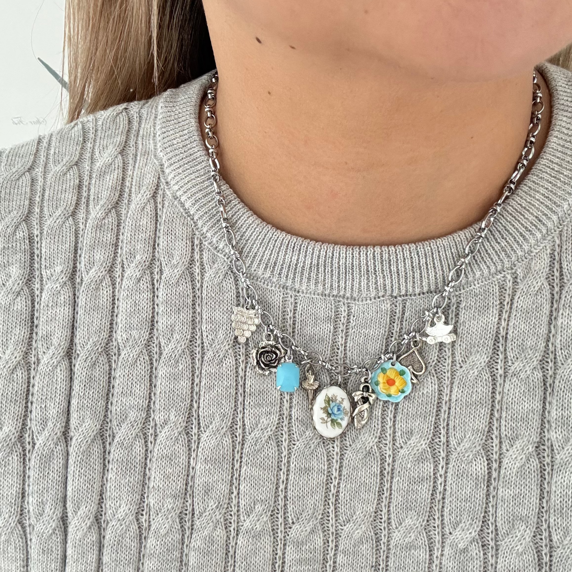 Model wearing Lucia Necklace styled with soft blouse