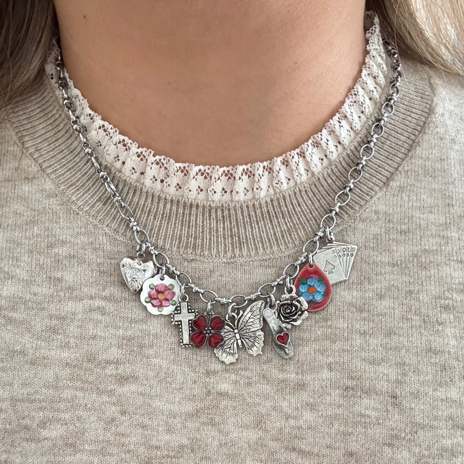 Model wearing Odette Necklace layered with other vintage chains
