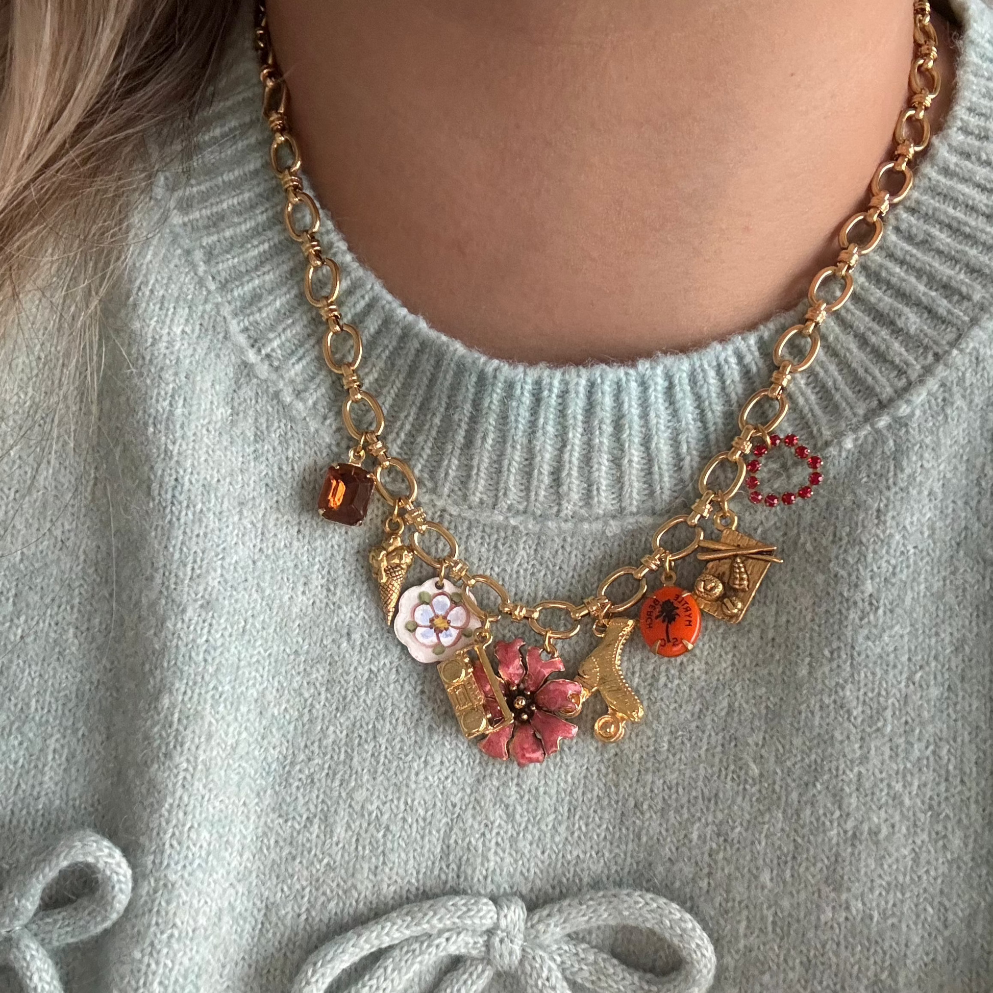 Model wearing the Gilian Necklace styled playfully