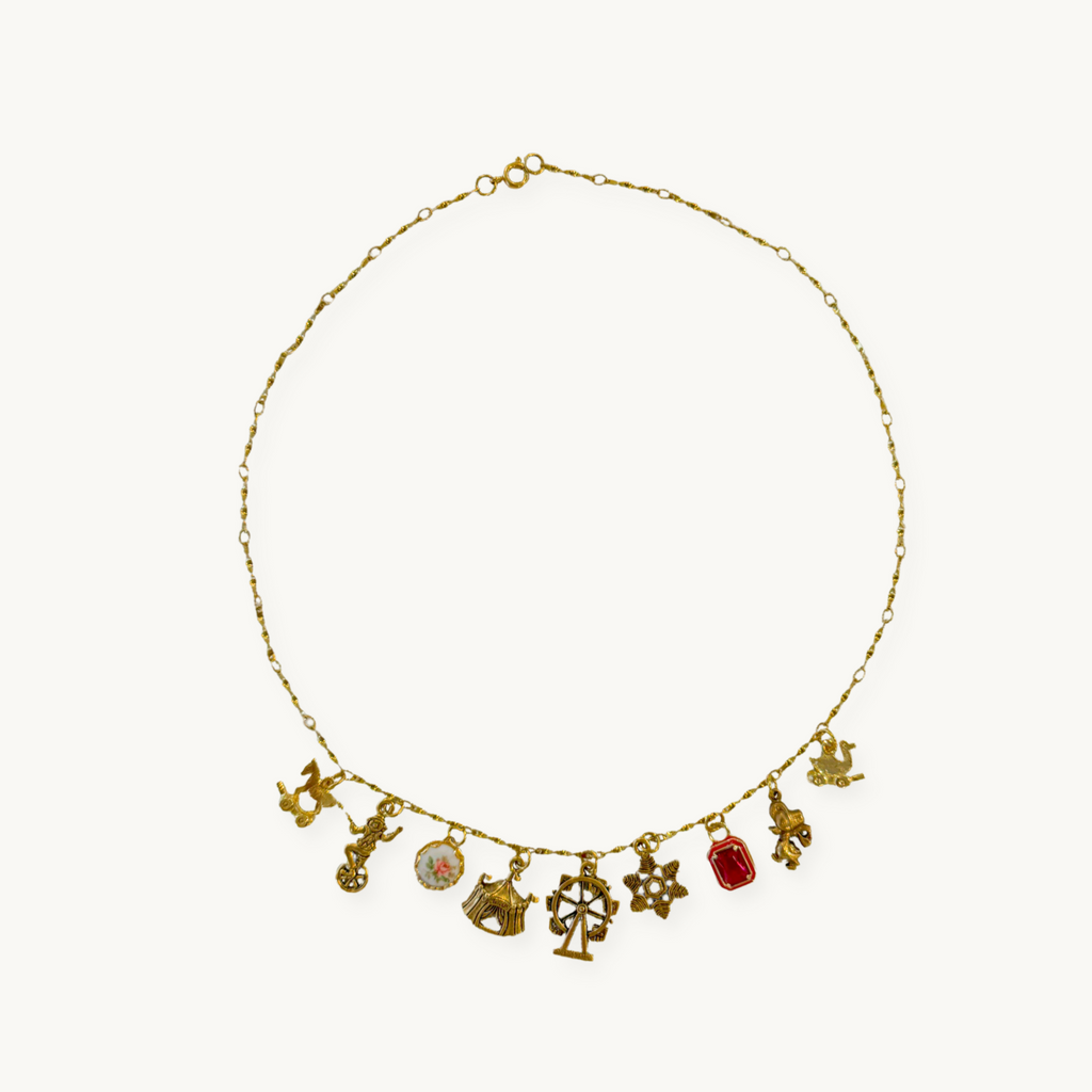 Flat-lay of the Kayla Necklace against a neutral background for a classic look.