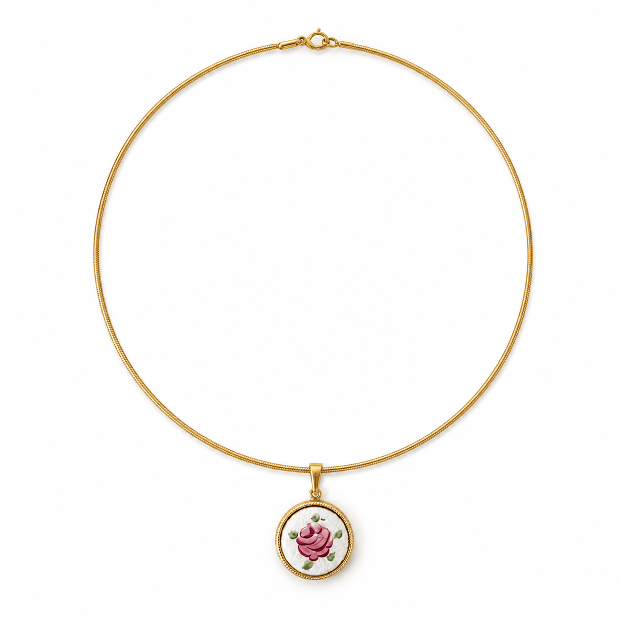 A delicate gold chain necklace with a small circular pendant featuring a pink rose on a white background, set against a plain white backdrop.