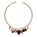 Lisa Necklace flatlay with lucky and vintage-inspired charms