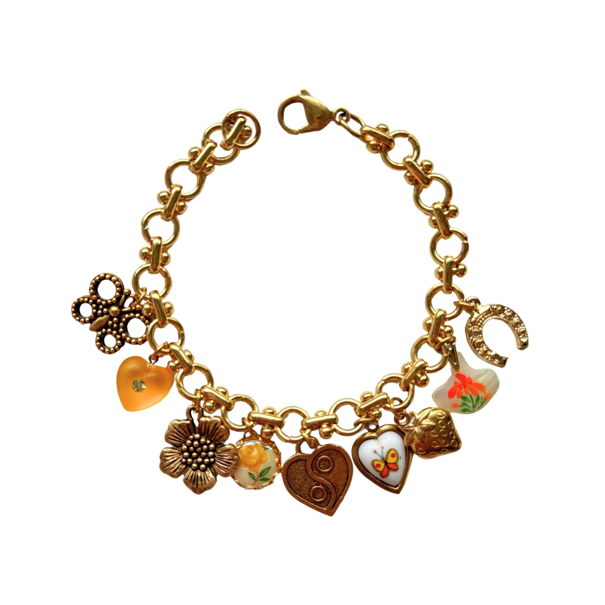 Gold-plated charm bracelet with strawberry, butterfly, and sunflower on a Yennifer chain