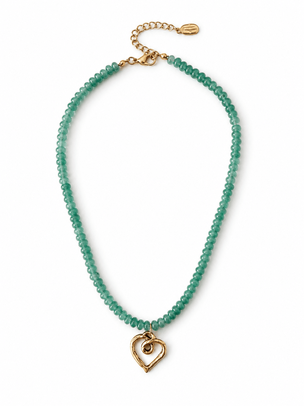 A beaded necklace featuring small, faceted green beads and a gold heart-shaped pendant, displayed on a clean white background.