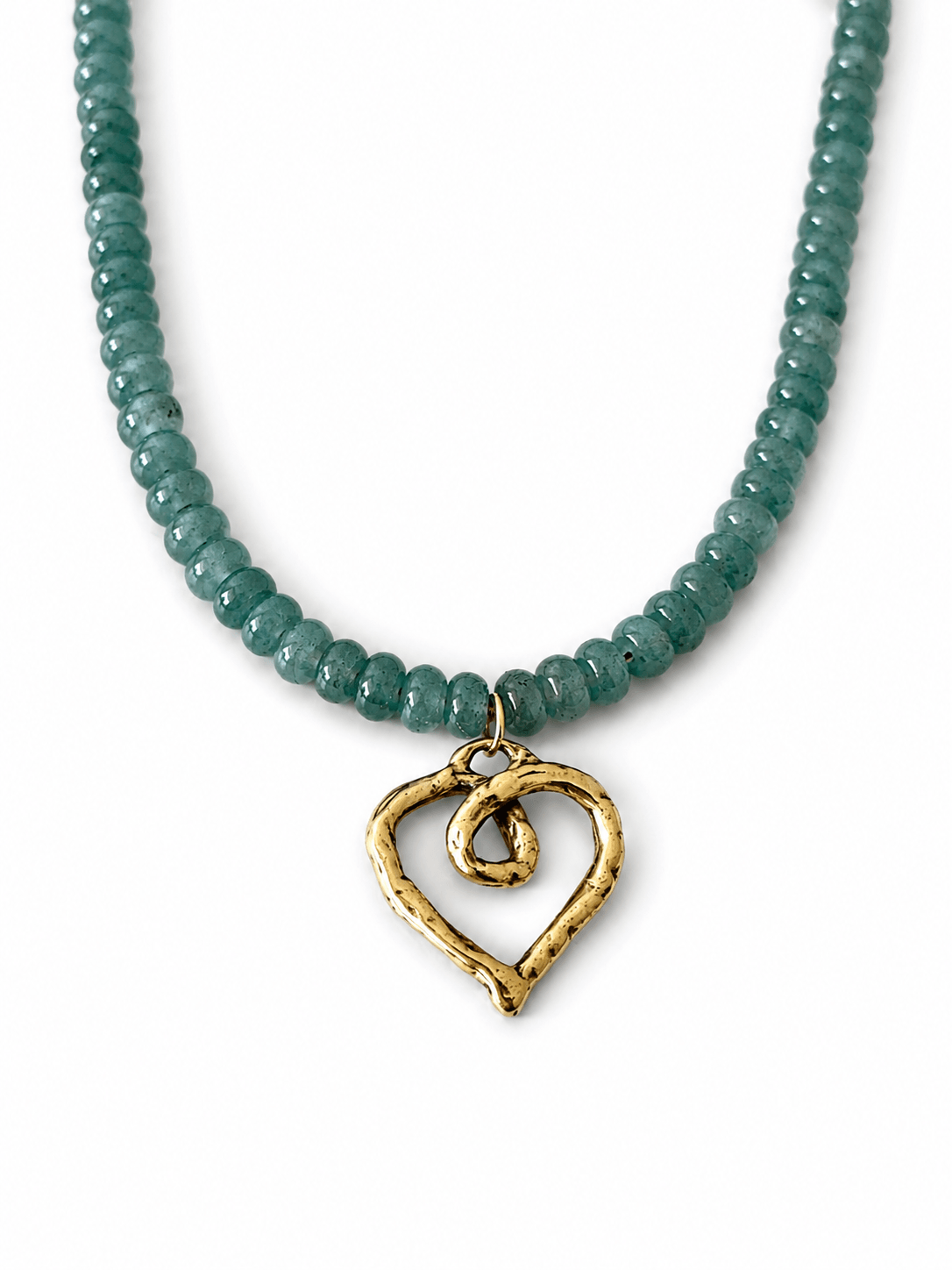 A beaded necklace featuring faceted teal-green beads and a textured gold heart-shaped pendant with a spiral detail, shown on a plain white background.