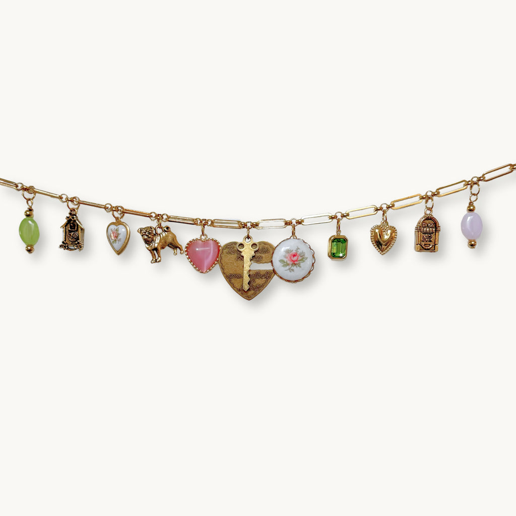 Close-up of the Millie Necklace featuring the heart and key vintage pendant.