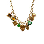 Close-up of fireplace, pillow, and trellis heart gold charms

