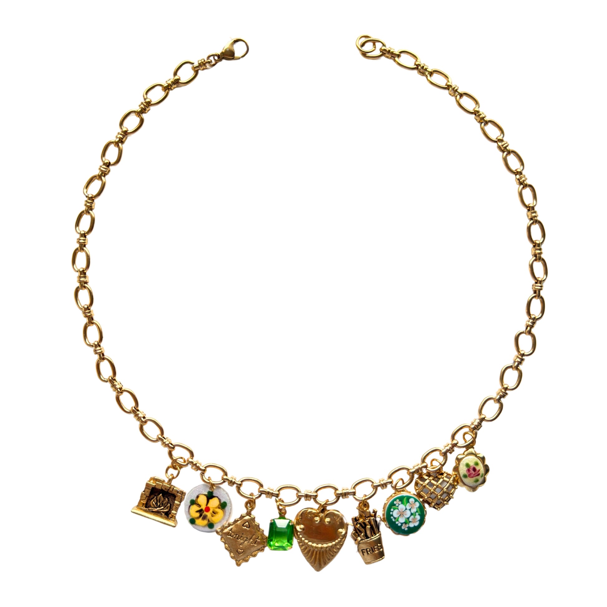 Nadia Necklace flatlay with quirky and vintage charms