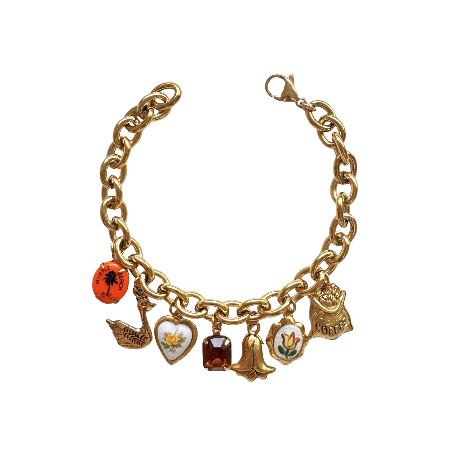 Chunky charm bracelet with hand-painted details and bold gold chain