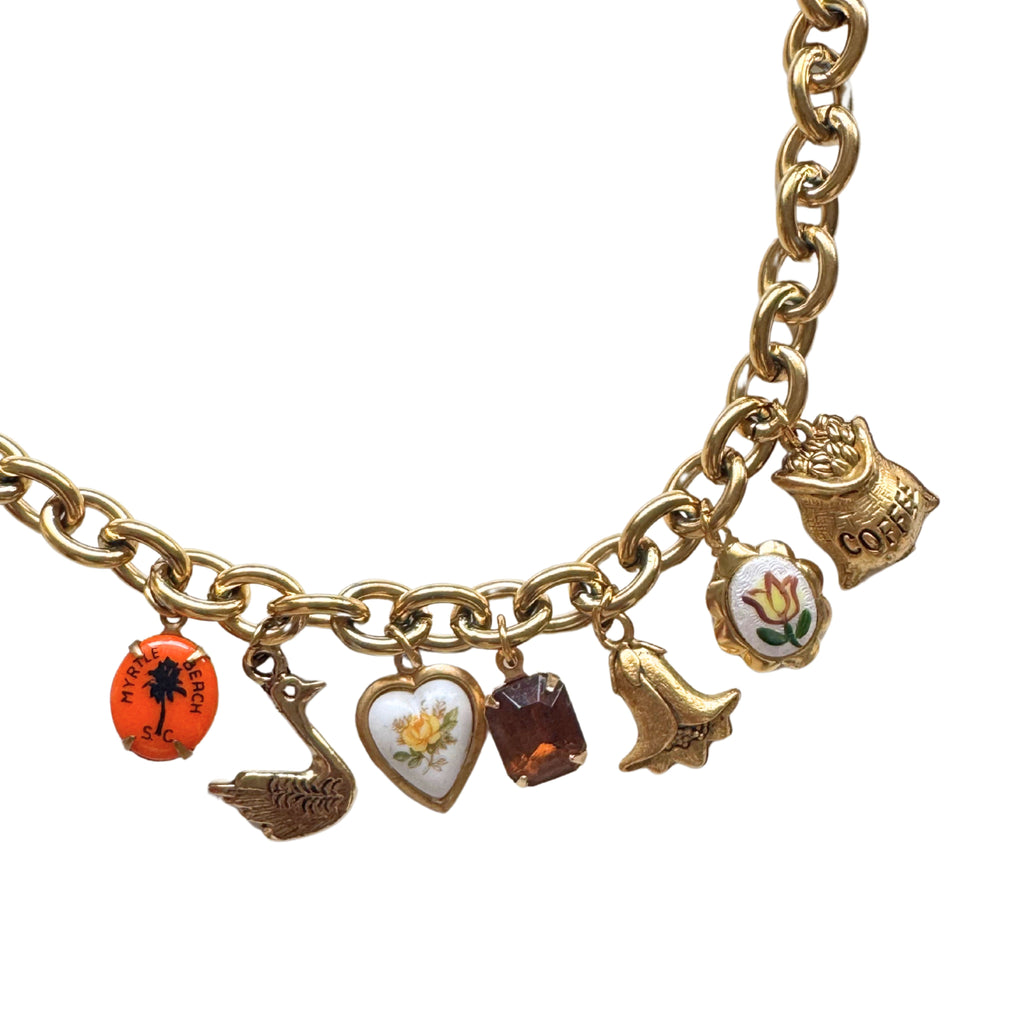 Natalya Bracelet with eclectic mix of vintage charms and gold O-link chain