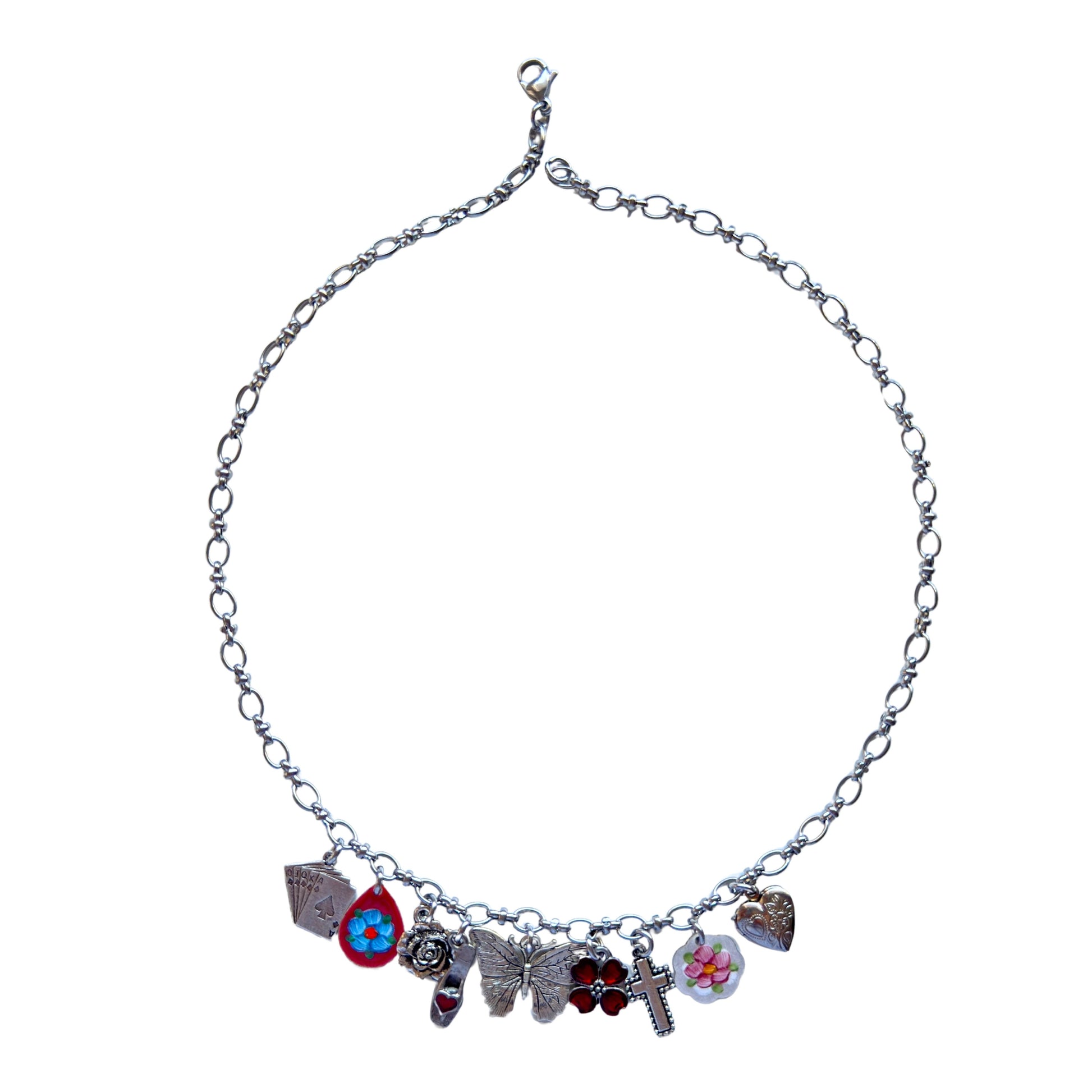 Odette Necklace flatlay showing all vintage-inspired charms
