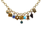 Close-up of blue flower guilloche and rhinestone drop