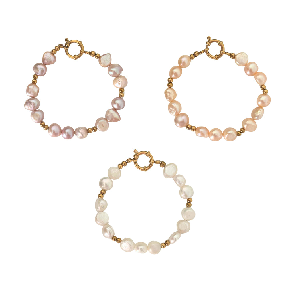 Natural pink, pearl, and peach-hued baroque pearl bracelet with gold detailing