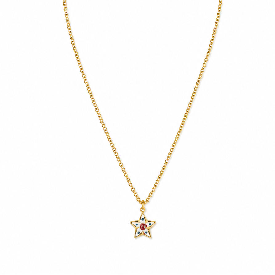 A gold chain necklace with a small star-shaped pendant featuring a colorful gemstone design, displayed on a clean white background.