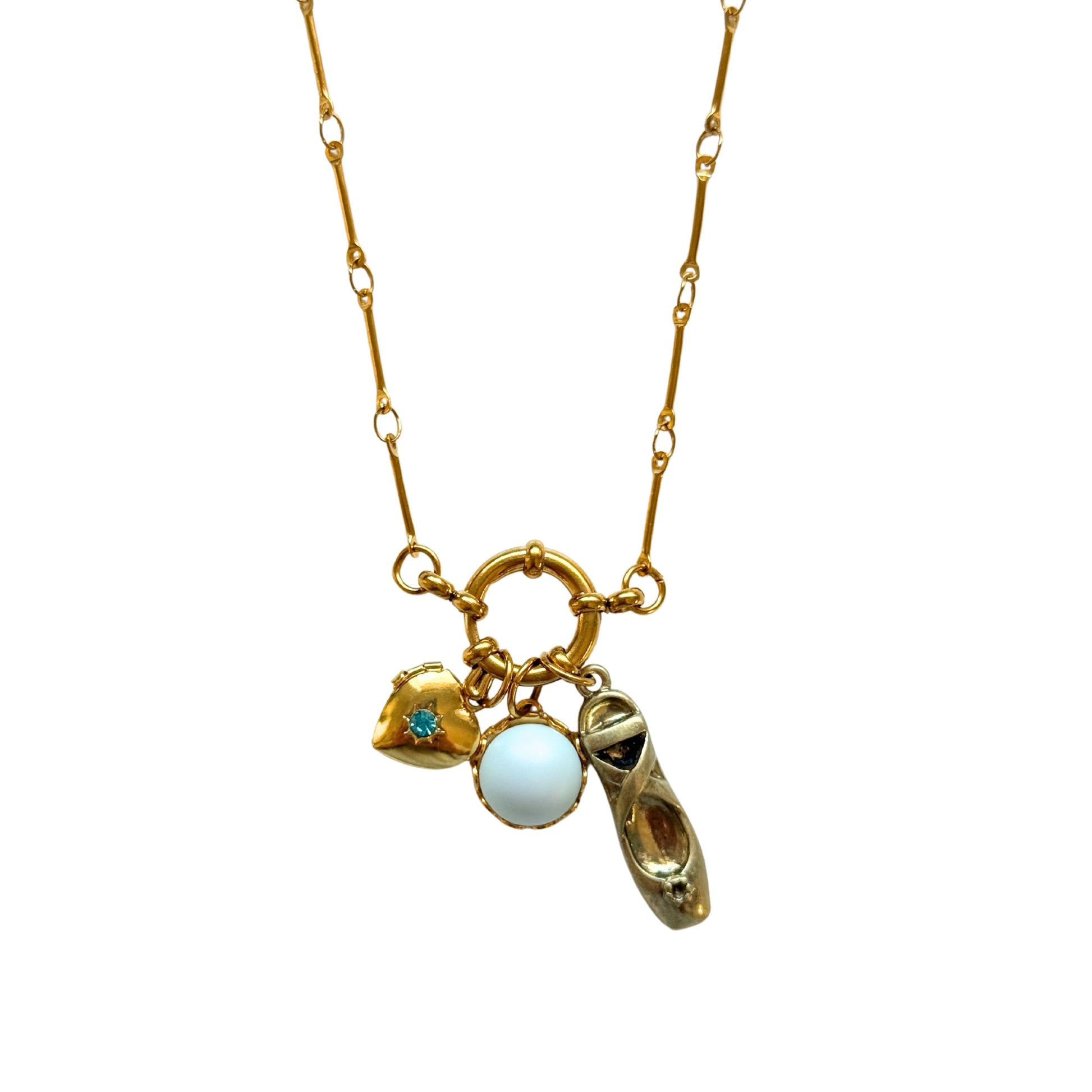 Close-up of Sylvie charm necklace details